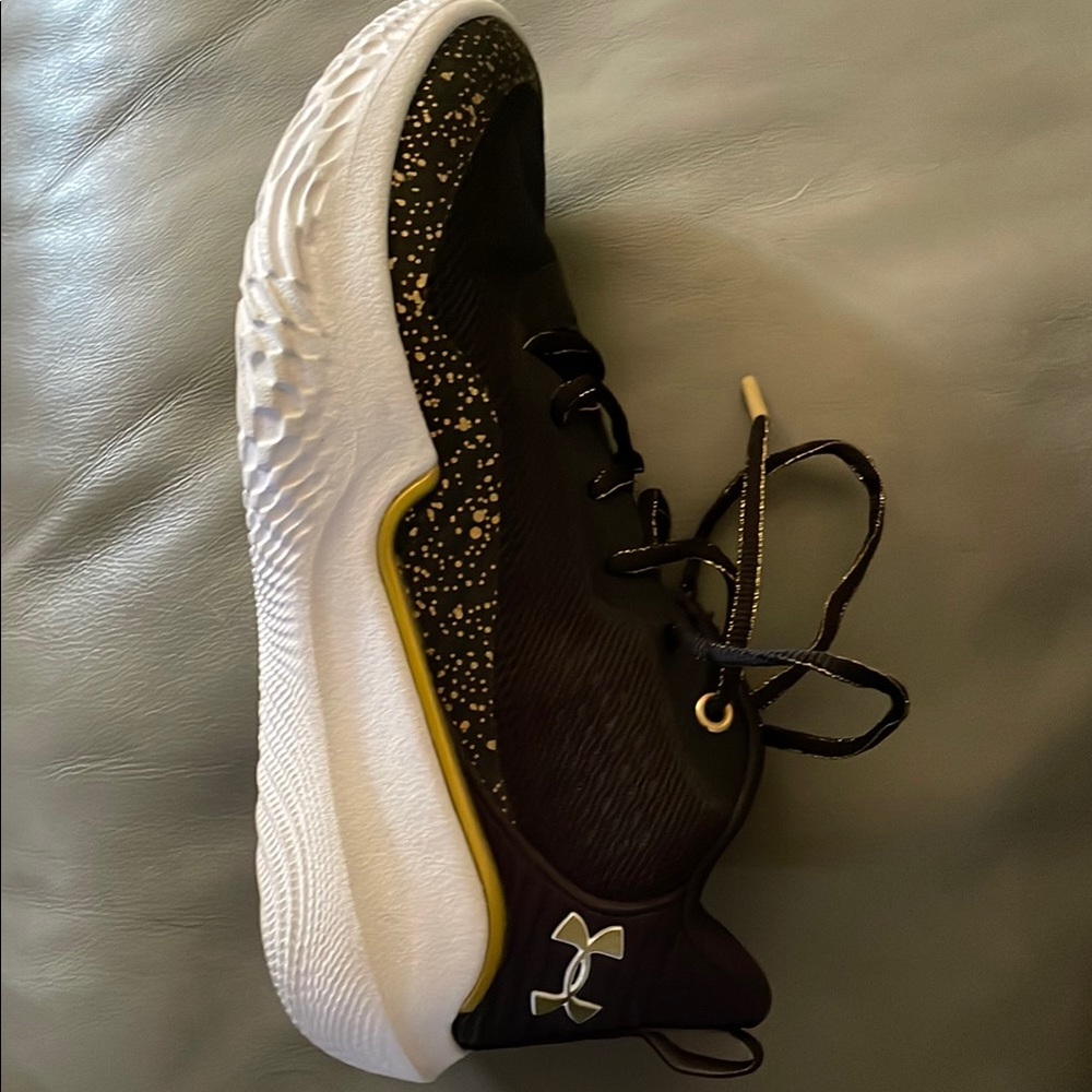 Under Armour Black and White shoes with Gold